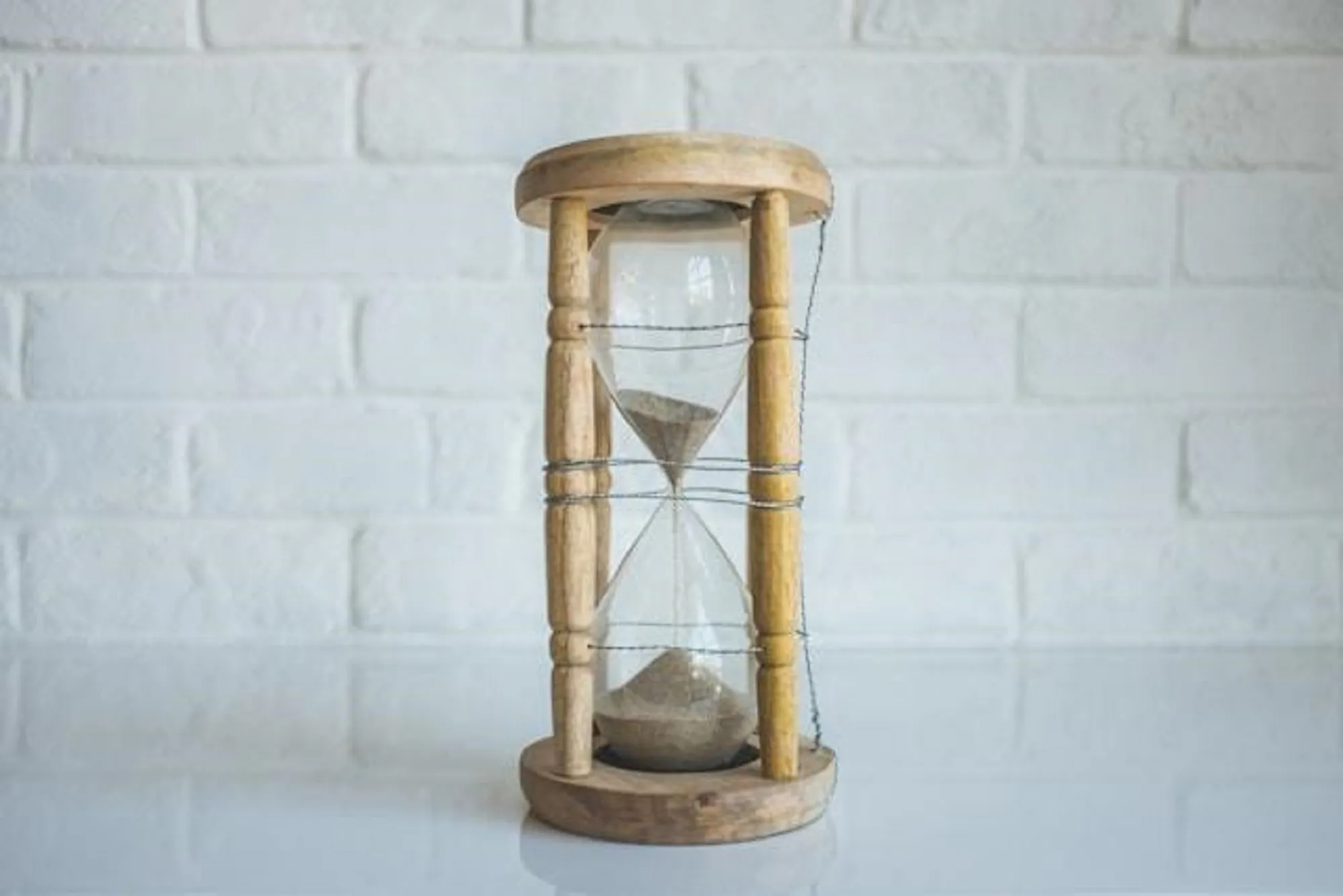 Hourglass on a white surface