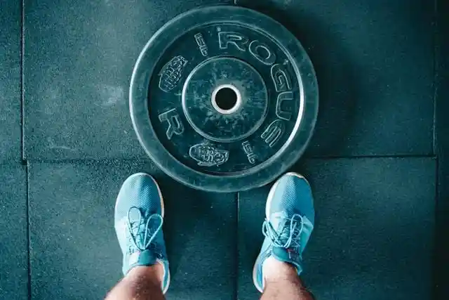 Feet next to a weight
