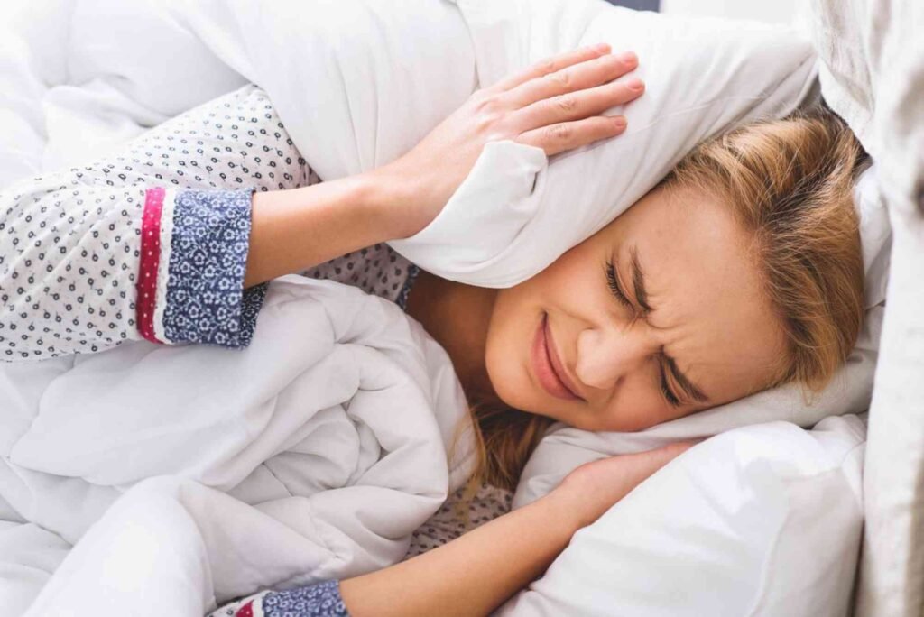 How to Sleep in a Noisy Apartment: Soundproofing and Sleep Hacks